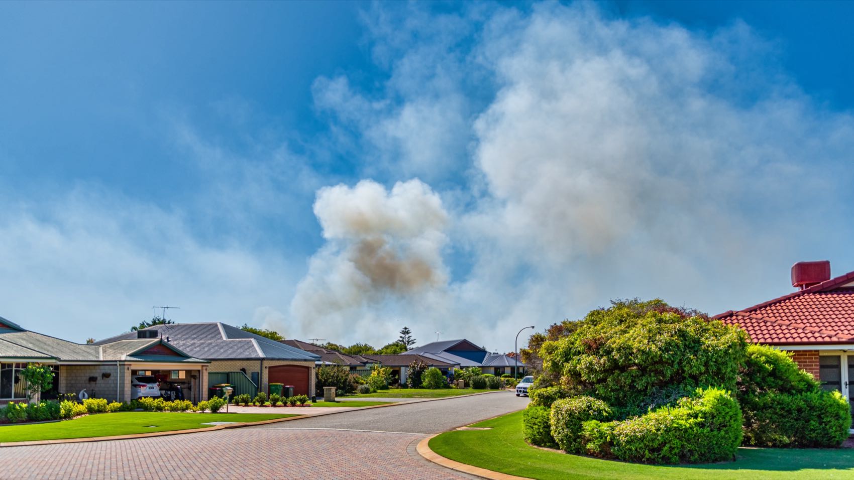 Suburban community near bushfire smoke
