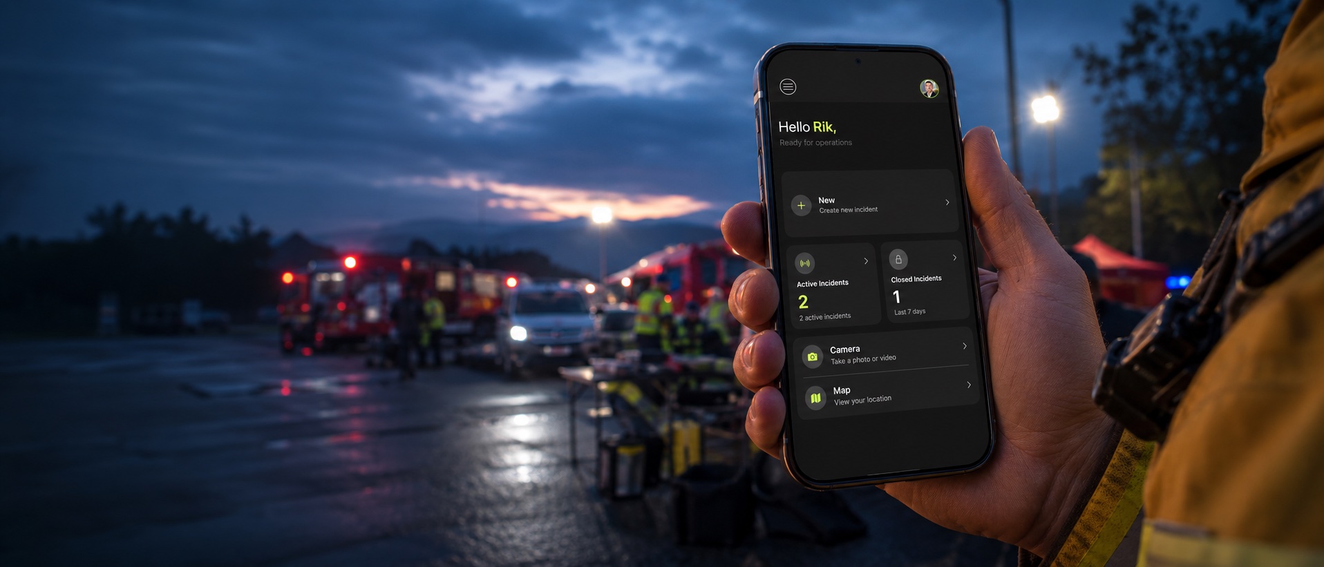 Firefighter using CrisisCMD on iPhone during a structure fire response