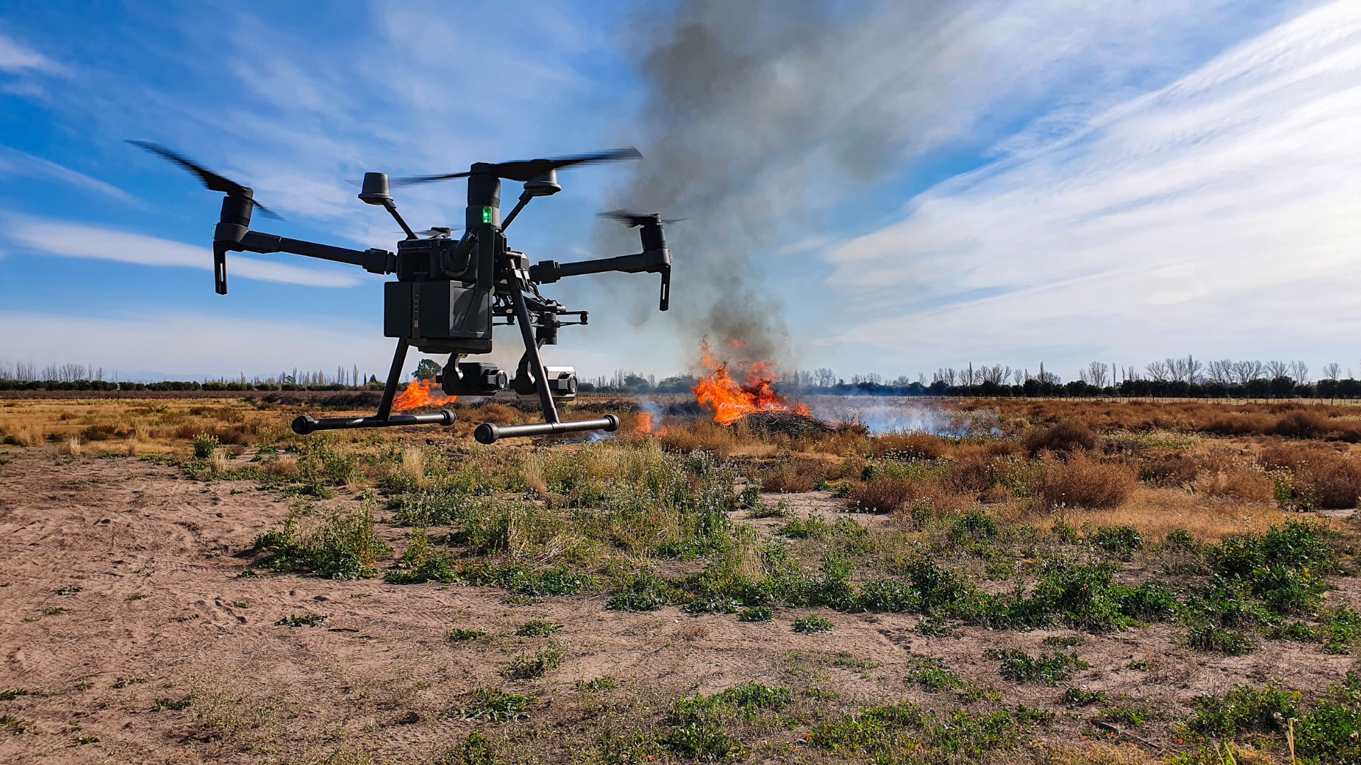 Remotely piloted aircraft in flight over open country